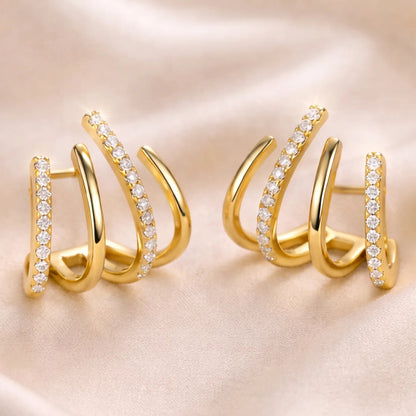 Boucles Griffe, quatre arcs plaqués or 18 carats